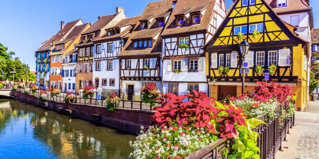 Colmar, Alsace, France. Petit Venice, water canal and traditional half timbered houses.
